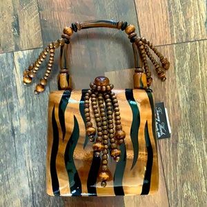 Only 4 days left to purchase Timmy woods purse